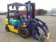 Вилочный погрузчик с рулонным захватом Komatsu